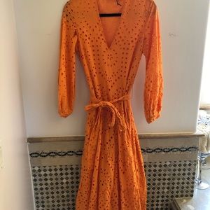 self tie V-neck, long eyelet dress with cuffed sleeves